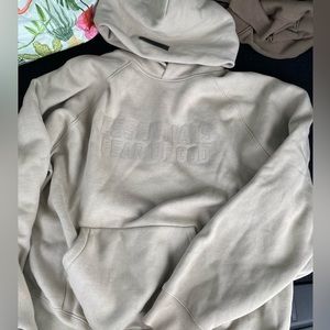 Fear of god essentials hoodie in tan